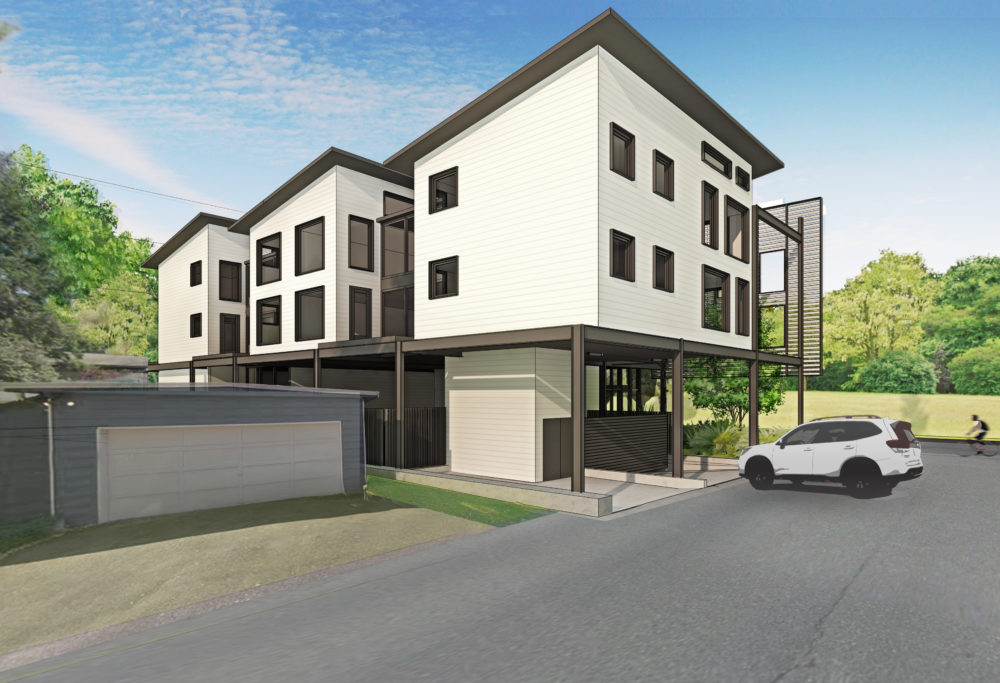 A view of the back of the building and the garage entrance.