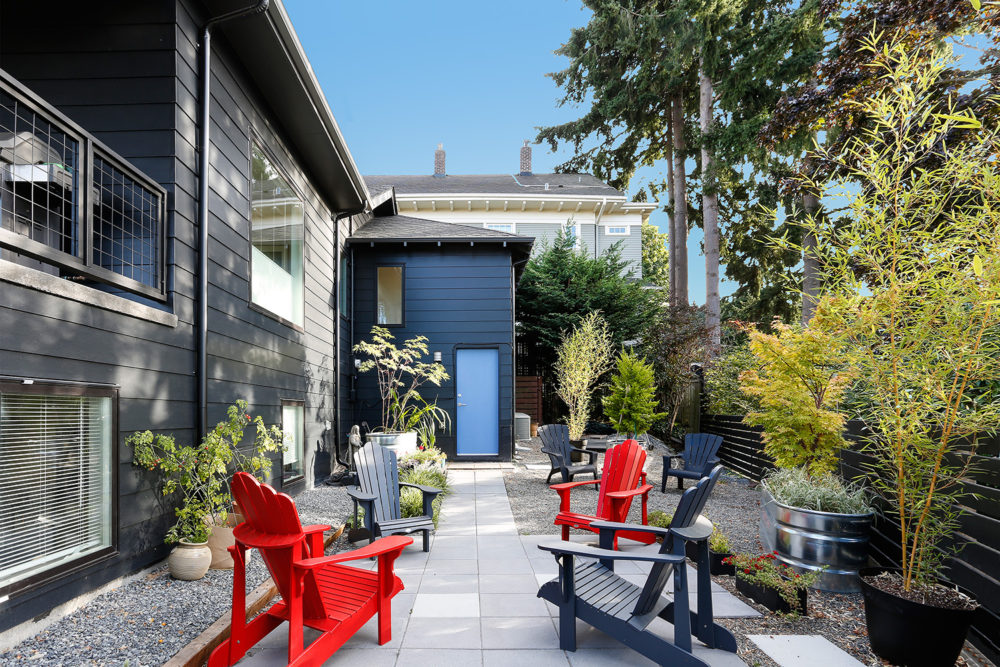 An of the back door from the paved patio.