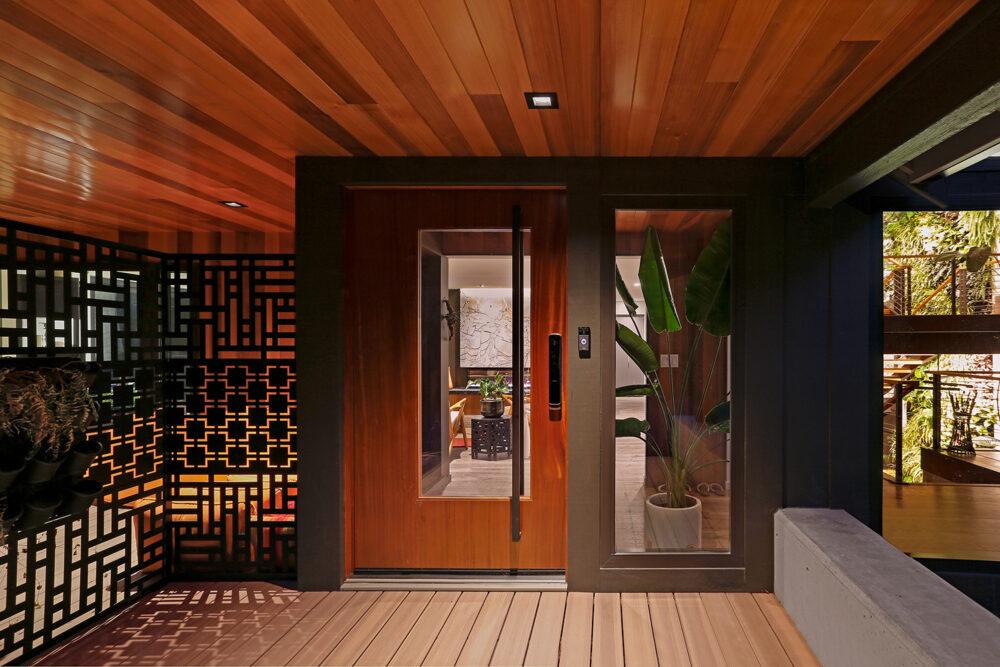 Close up view of the front door and the covered entry porch.
