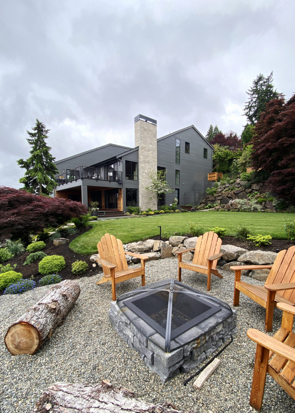 An overview of the north side of the house from the outdoor fire pit.