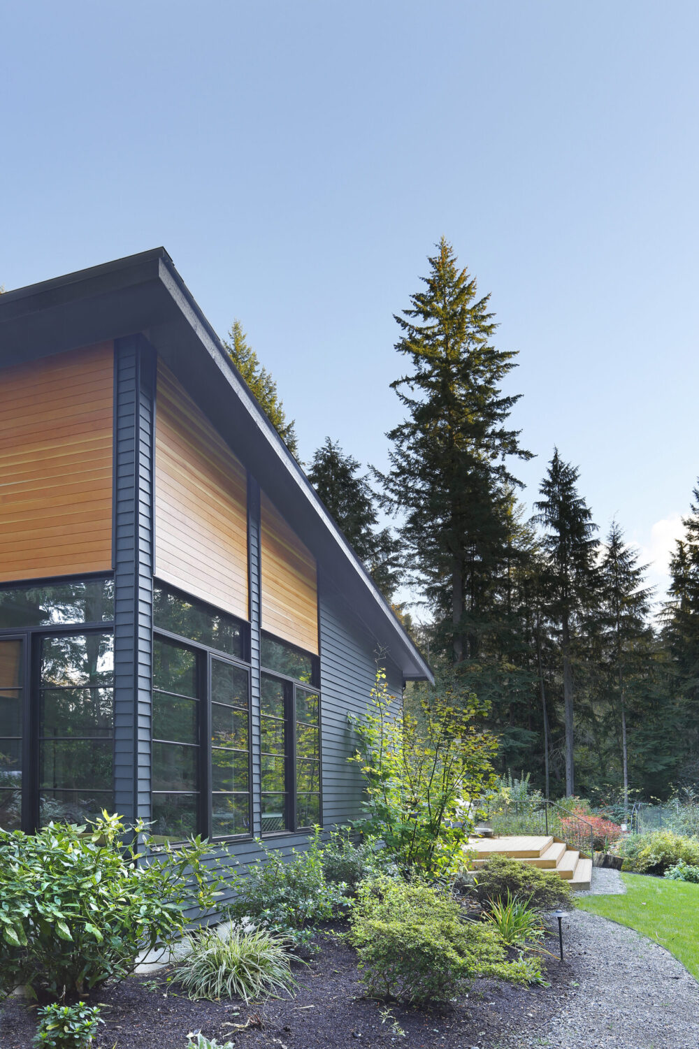 Close up view of the windows and different siding materials.